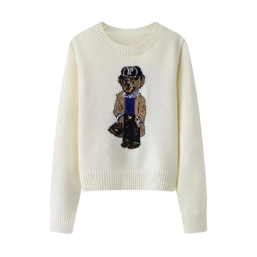 White sweater with embroidered bear design on a white background